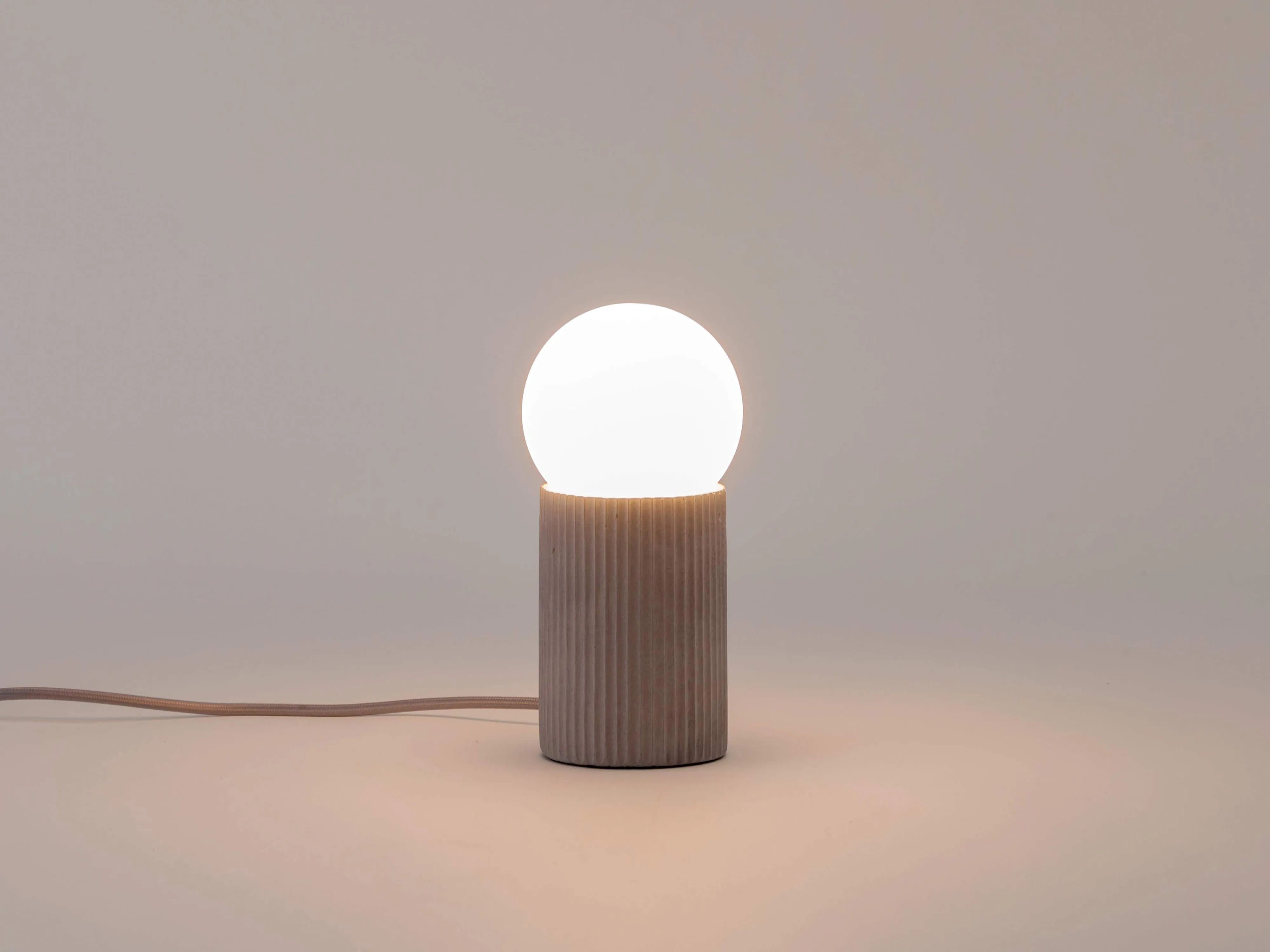 Grey concrete ribbed table lamp