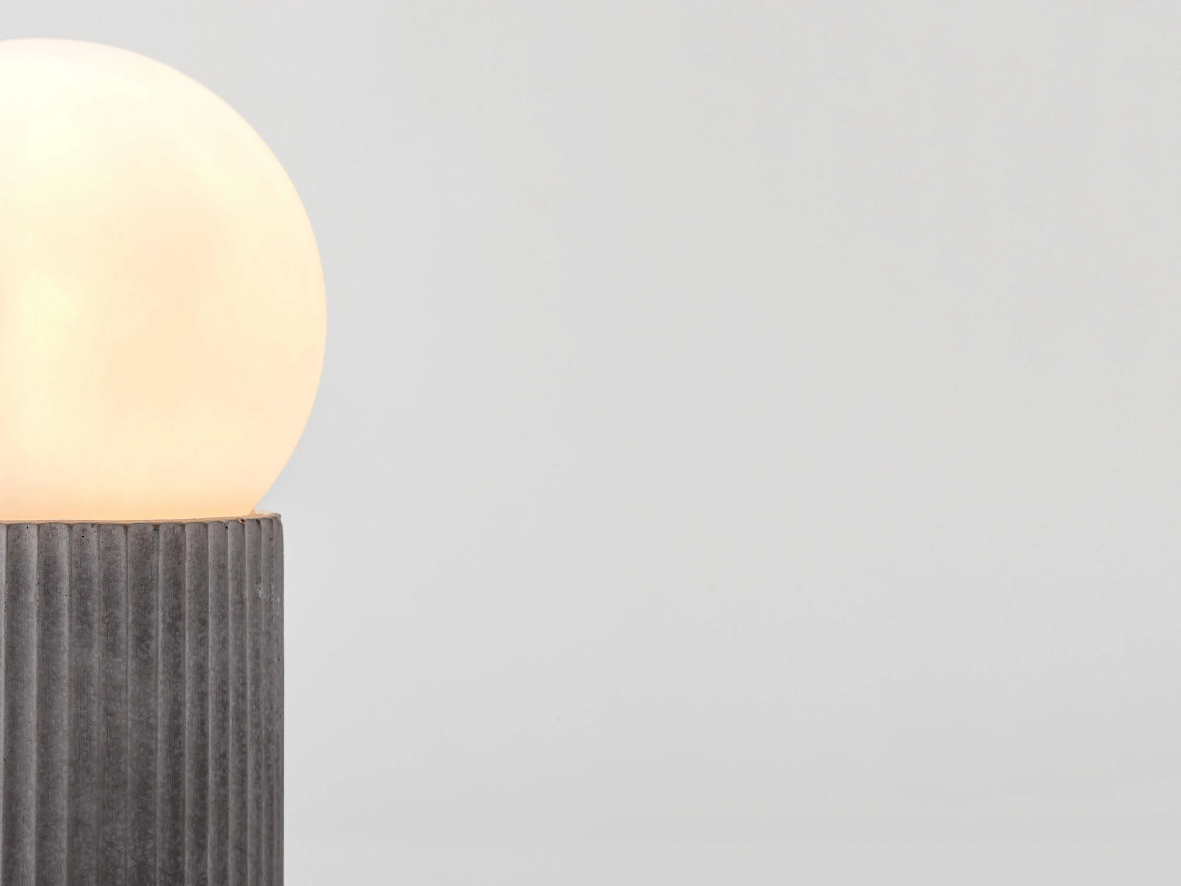 Grey concrete ribbed table lamp